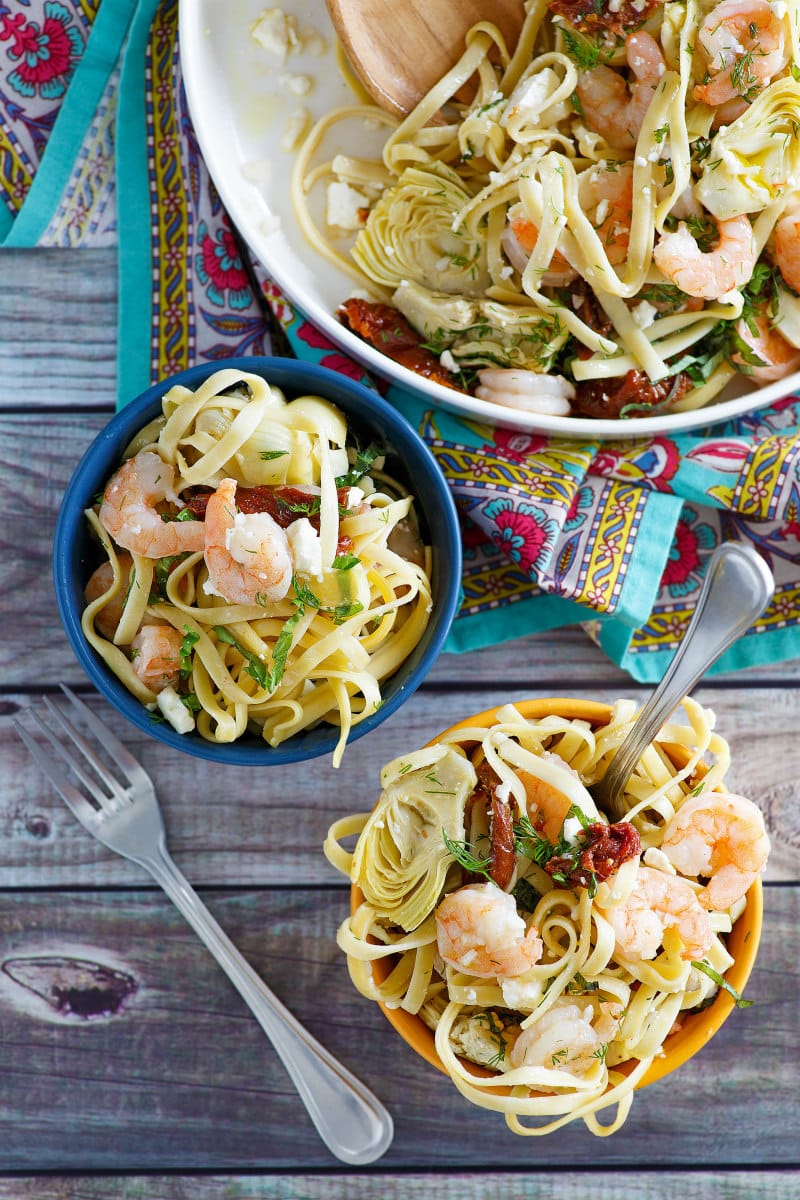 bowls of pasta with shrimp and feta