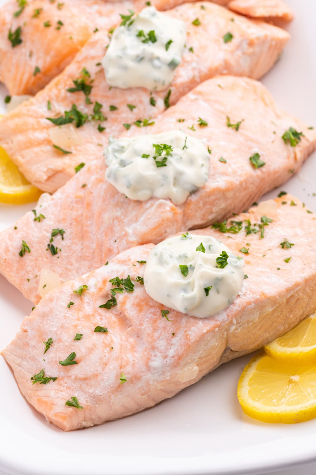 beer poached salmon filets topped with tarragon mayonnaise