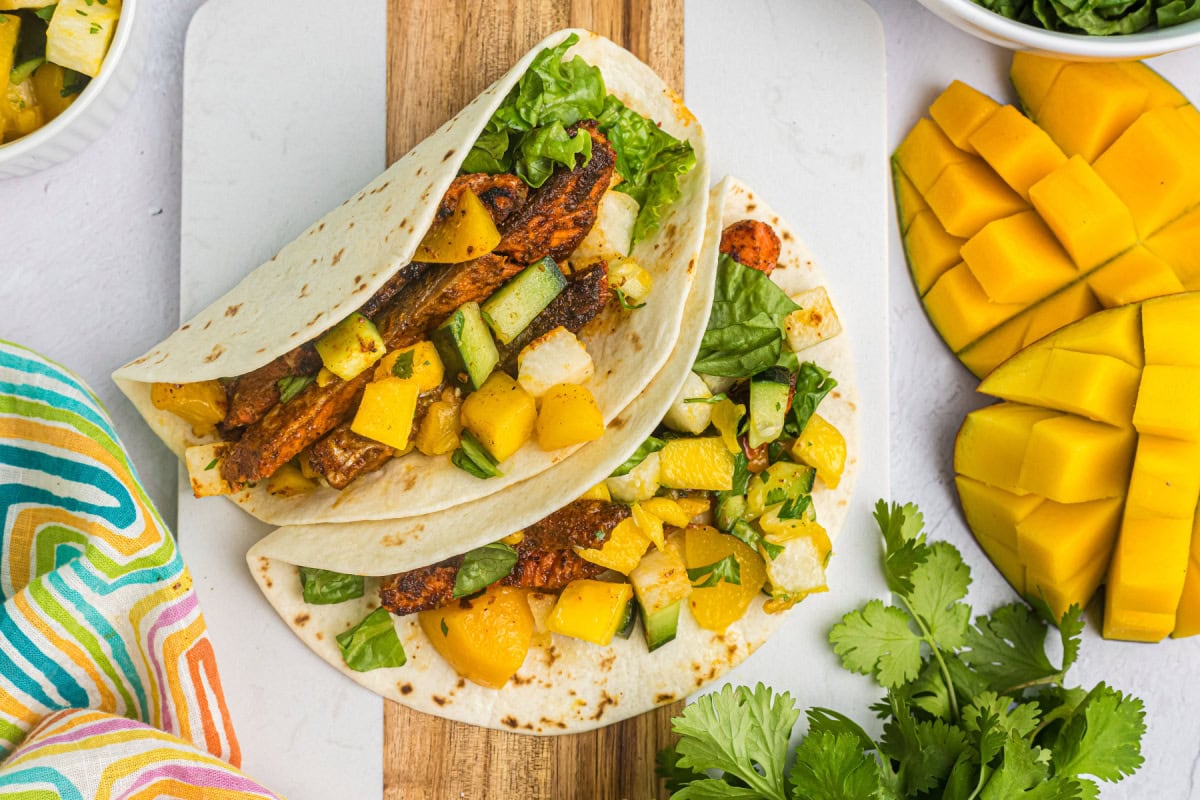 Blacked Salmon Tacos with Mango Salsa recipe from RecipeGirl.com : fish tacos overhead shot of blackened salmon tacos