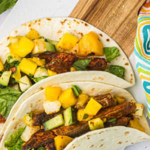 pinterest image for blackened salmon tacos