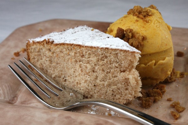 slice of ginger spice cake with a scoop of pumpkin ice cream