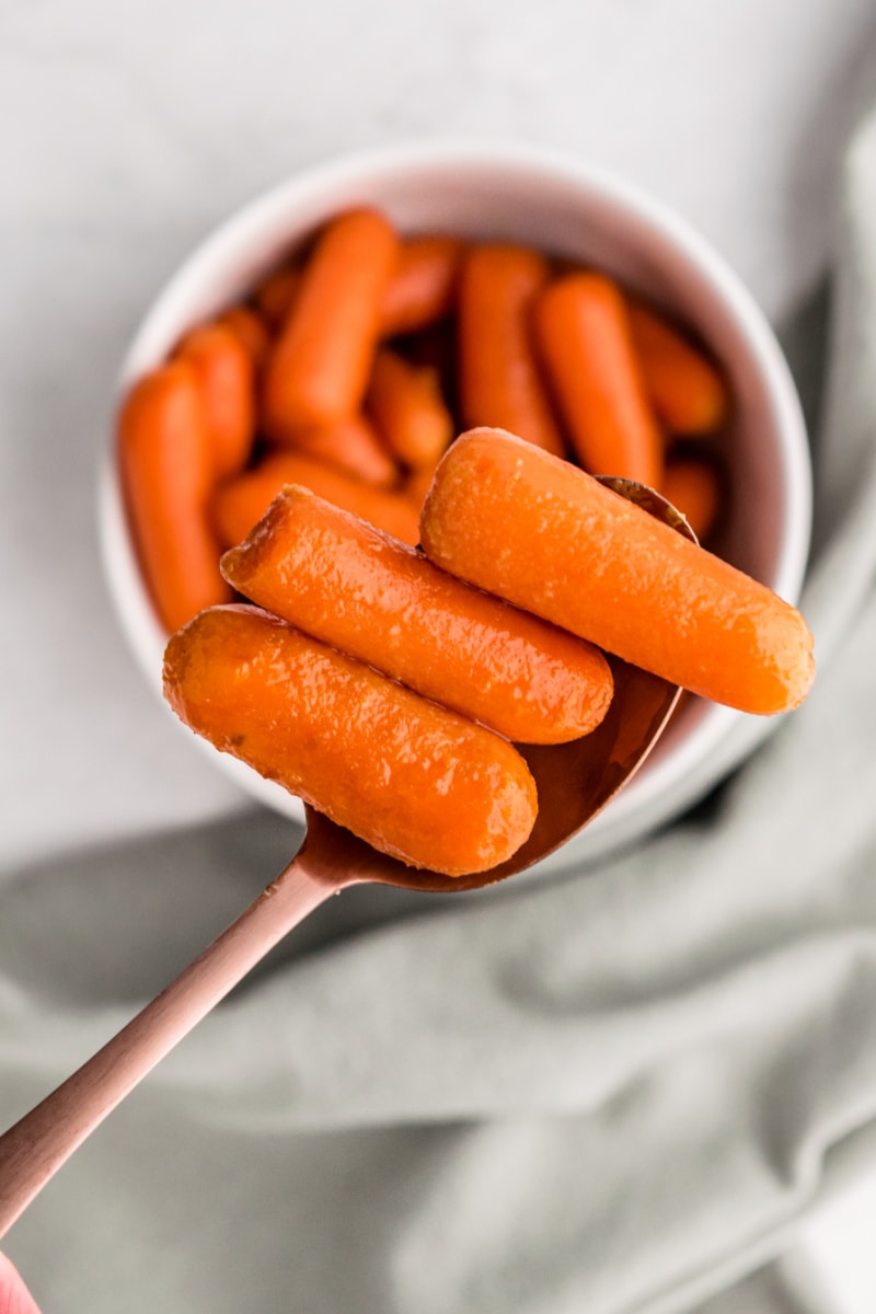 spoon full of baby carrots