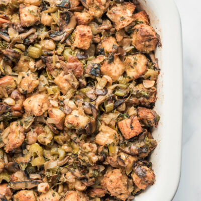 wild mushroom stuffing in a white casserole dish