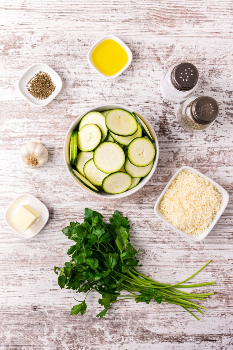 ingredients displayed for making parmesan zucchini slices