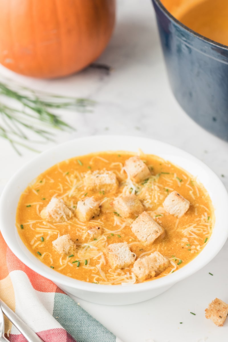 pumpkin soup in a white bowl