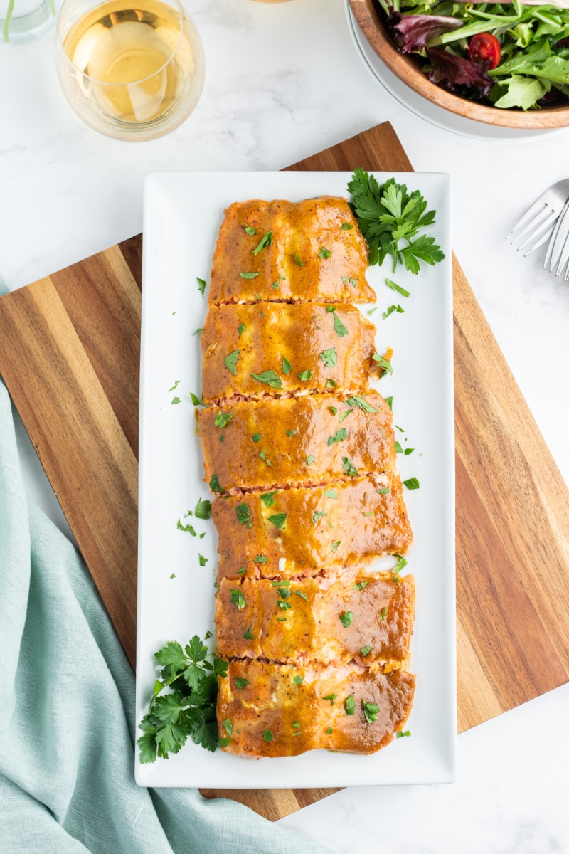 white tray with salmon on top ready to serve