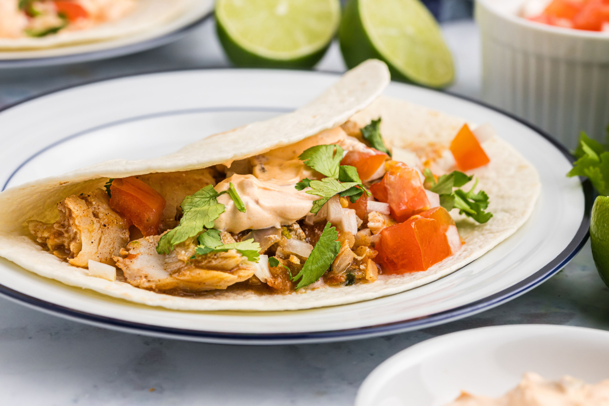 snapper taco laying on its side so you can see inside