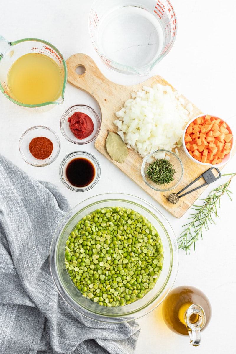 ingredients for split pea soup displayed in bowls