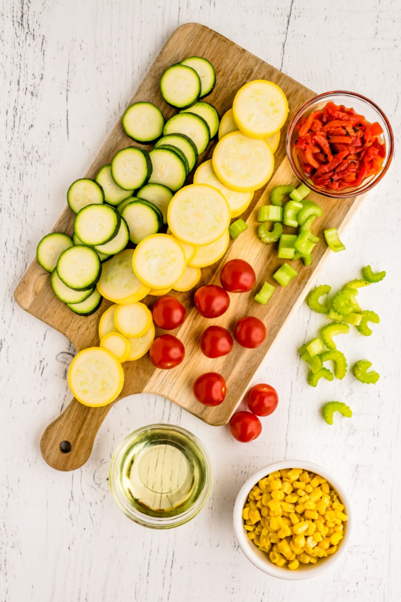 ingredients displayed for summer squash with cherry tomatoes