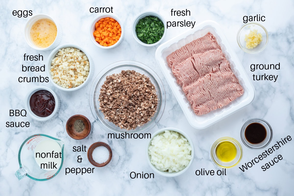 Moist Ground Turkey Meatloaf made with lean turkey, veggies, and BBQ sauce for flavor. Healthy, high protein, and never dry. Easy weeknight dinner recipe. ingredients displayed for making ground turkey meatloaf