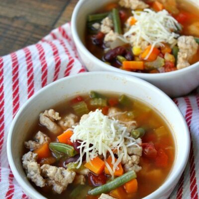 turkey vegetable soup in two bowls