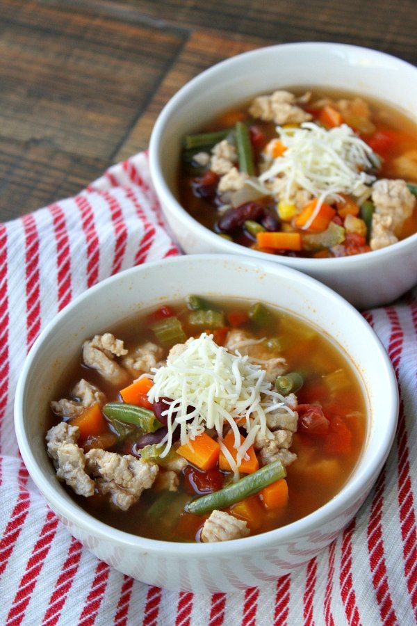 turkey vegetable soup in two bowls