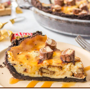 pinterest image for twix cheesecake pie