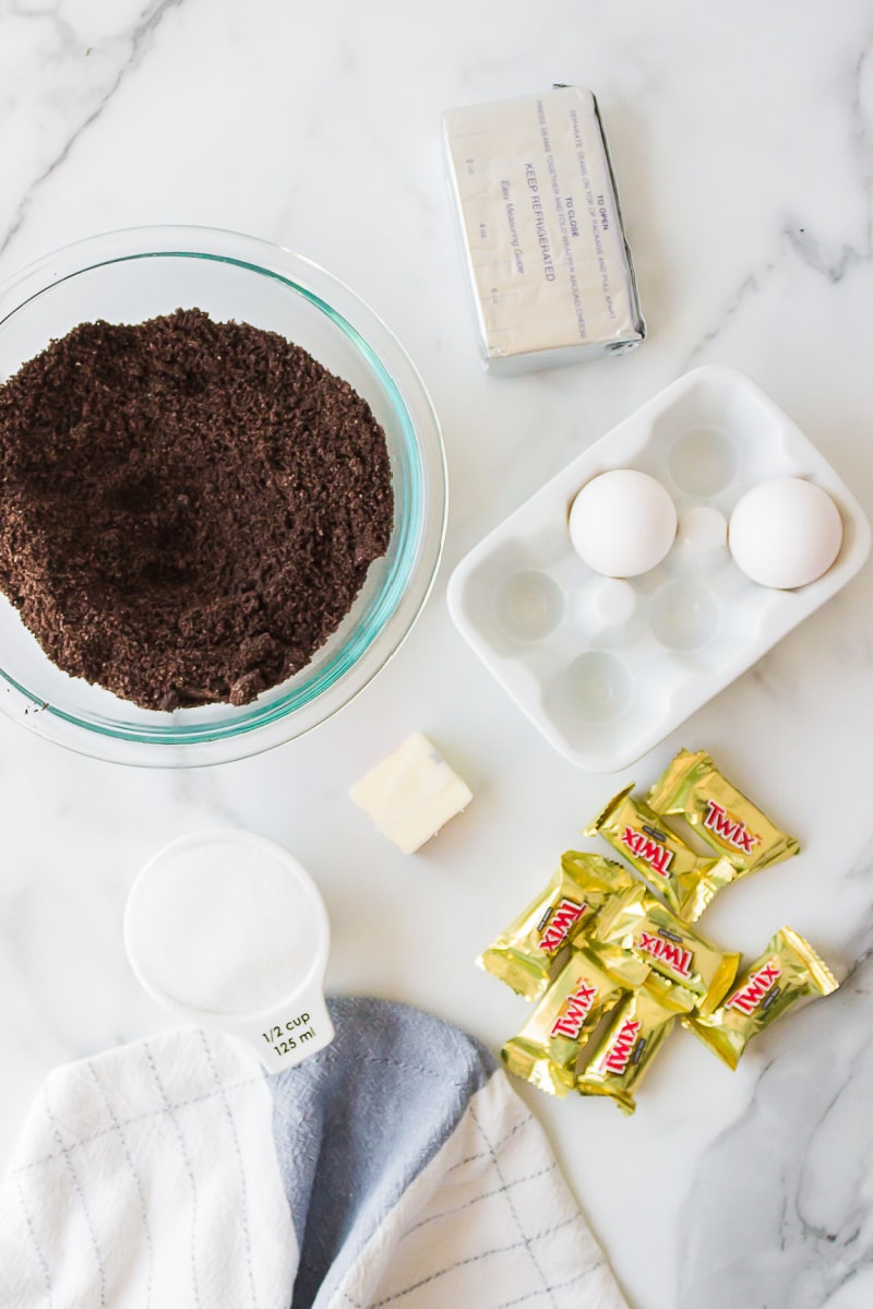 ingredients displayed for making twix cheesecake pie