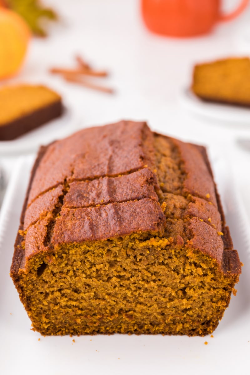 loaf of pumpkin bread cut open to see inside