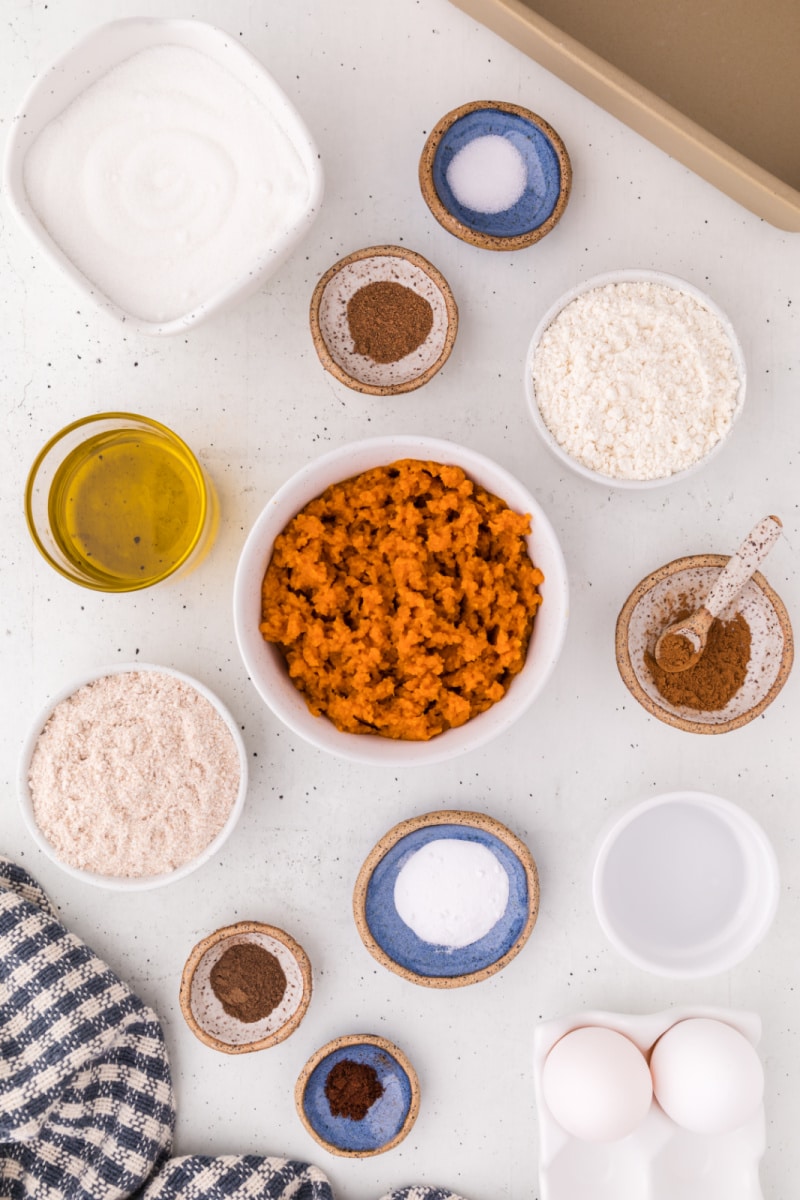 ingredients displayed for making whole wheat olive oil pumpkin bread