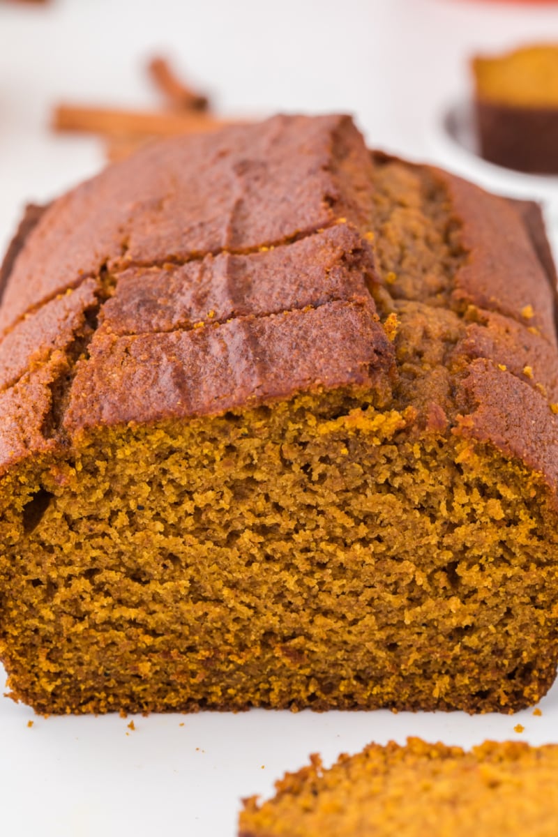 whole wheat olive oil pumpkin bread cut open to see inside