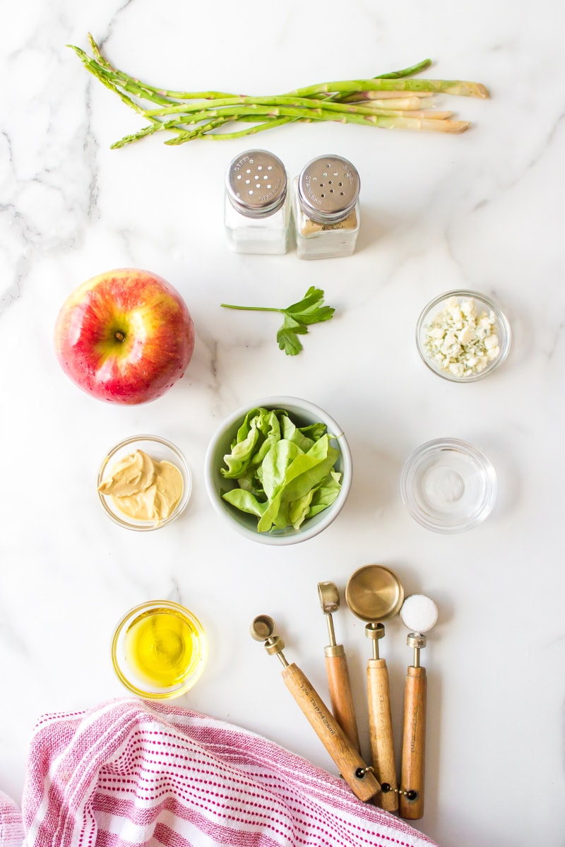 ingredients displayed for making asparagus apple salad