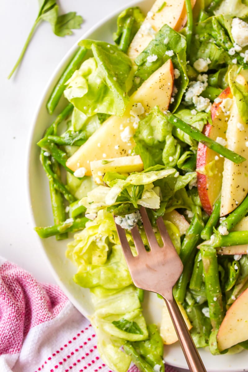 fork in a bowl of salad