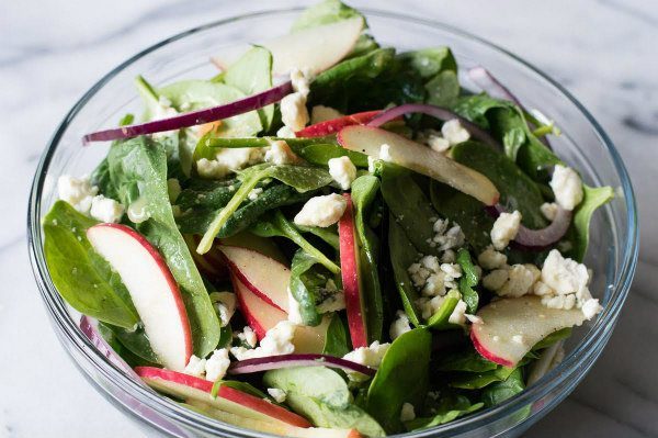 Autumn Apple and Spinach Salad recipe from RecipeGirl.com #autumn #apple #spinach #salad #recipe #RecipeGirl Autumn Apple and Spinach Salad in bowl