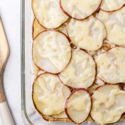 beer baked scalloped potatoes in pan