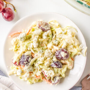 blue cheese cole slaw on a white plate