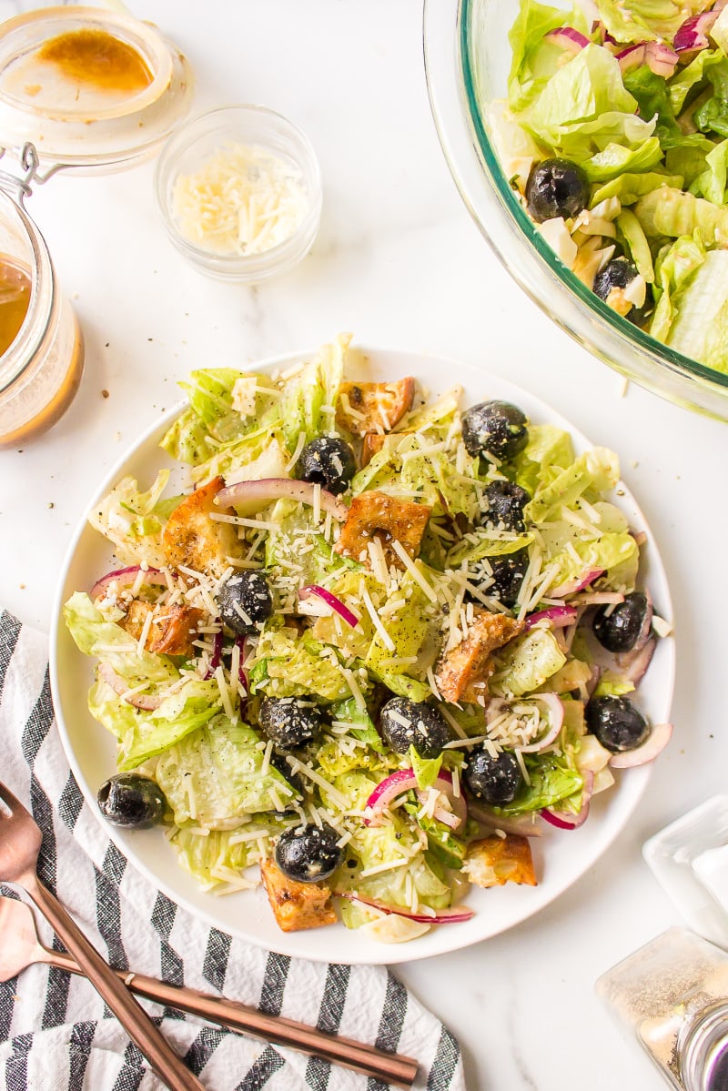 on a plate caesar salad with balsamic dressing