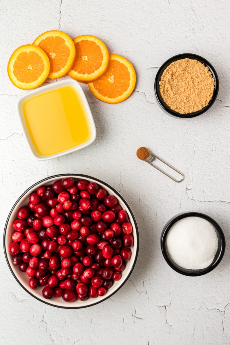 ingredients displayed for making cinnamon cranberry sauce