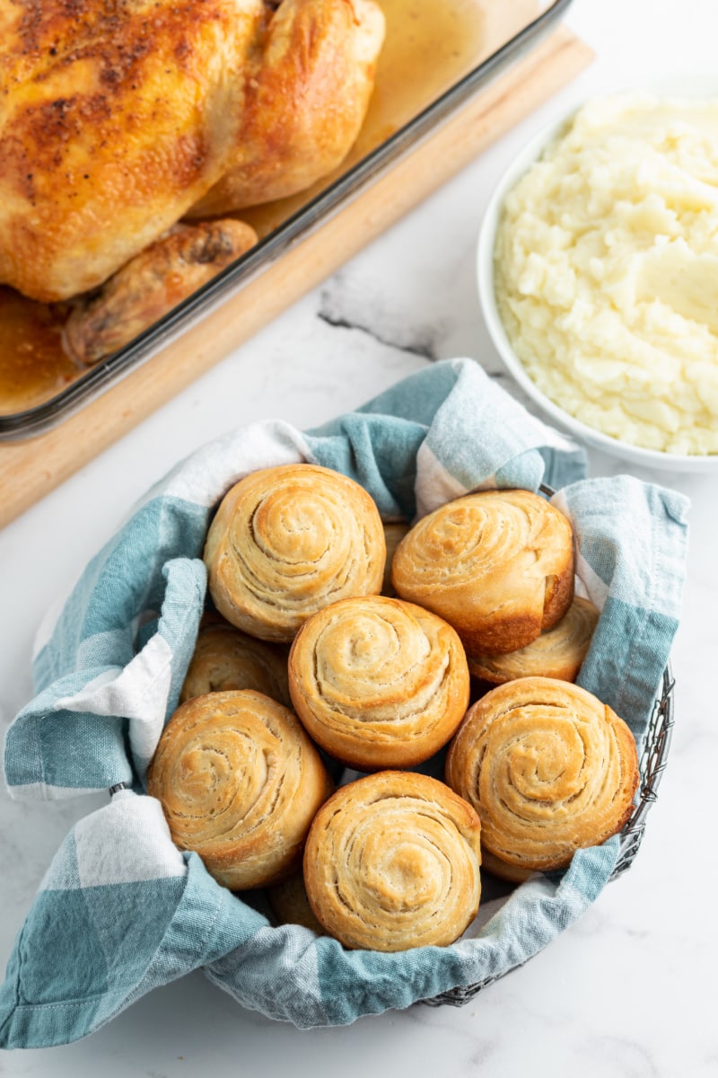 flaky dinner rolls in basket