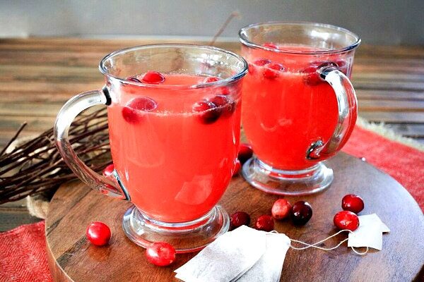 two mugs of cranberry tea