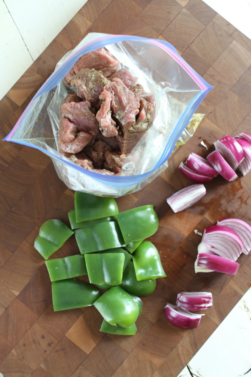 ingredients displayed for making lamb souvlaki