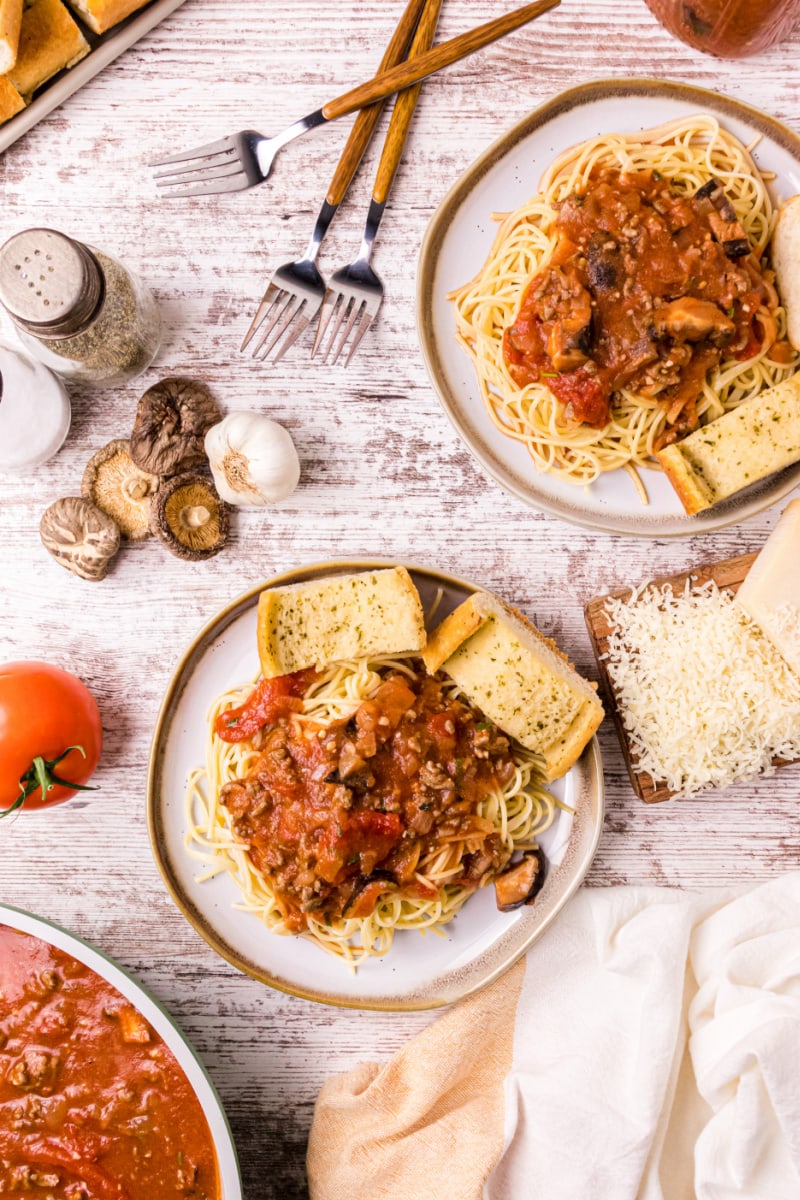 servings of spaghetti on two plates