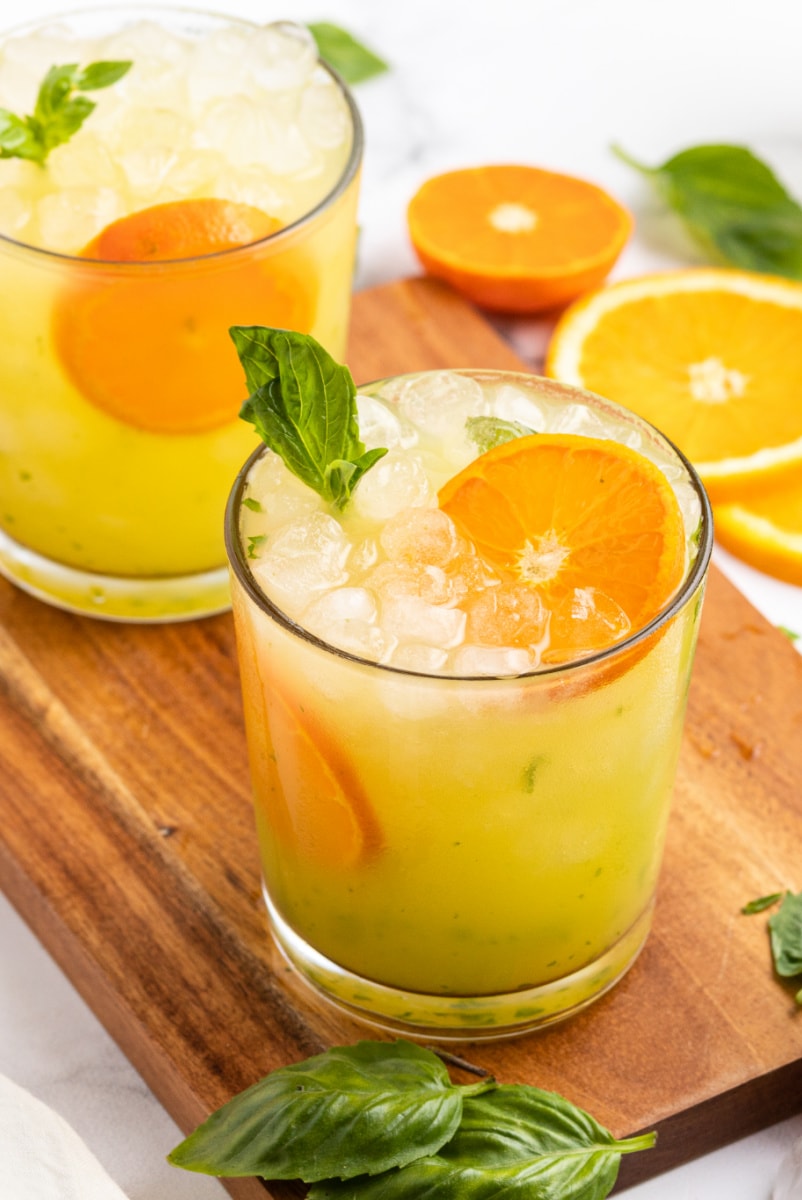 orange basil mojitos in two glasses