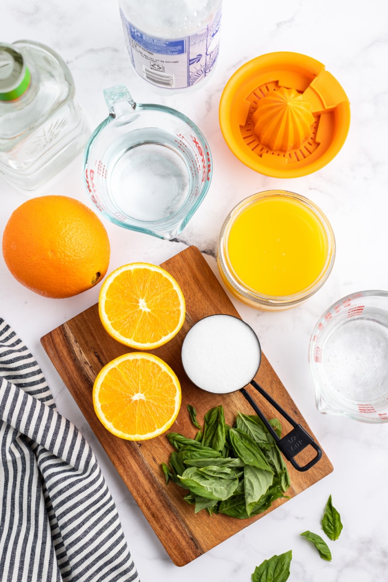 ingredients displayed for orange basil mojitos