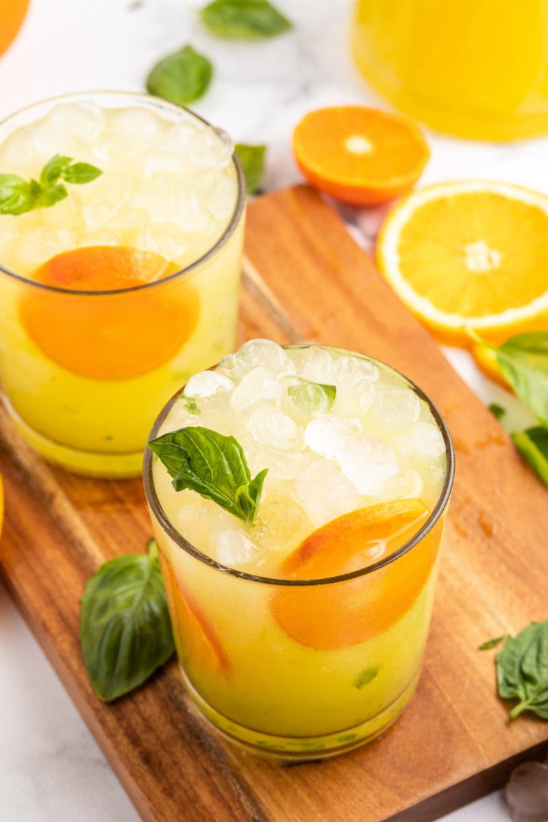 orange basil mojitos in two glasses
