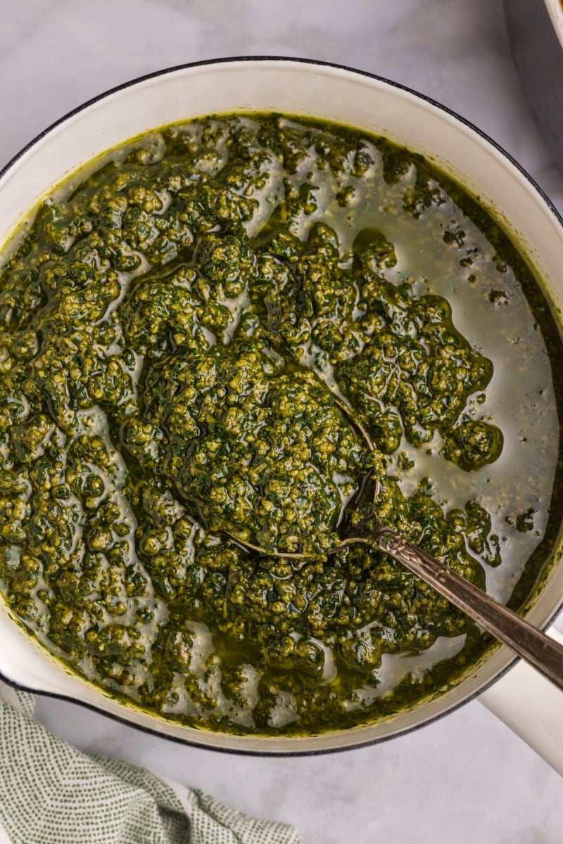 pan of pesto sauce with spoon