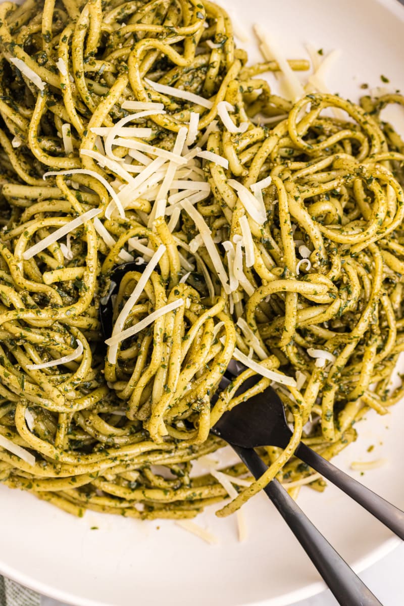 noodles tossed with pesto sauce and parmesan cheese