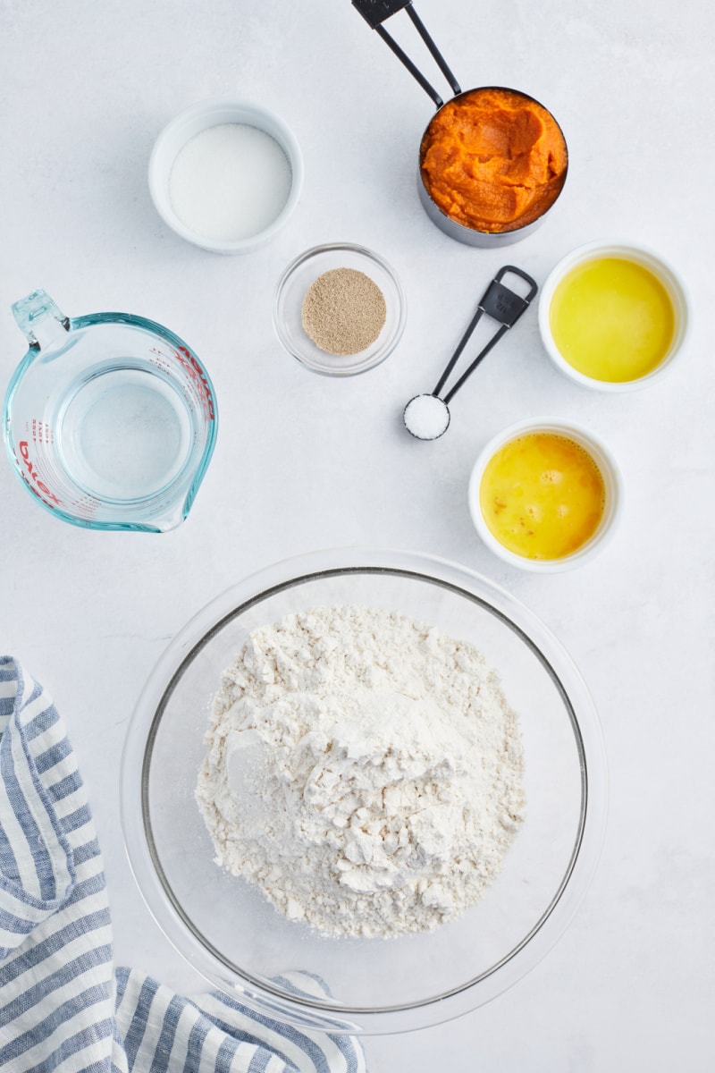 ingredients displayed for making pumpkin cinnamon rolls