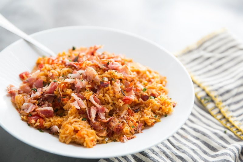 Easy Spanish Rice recipe from RecipeGirl.com #easy #spanish #rice #recipe #bacon #RecipeGirl Spanish Rice in a bowl