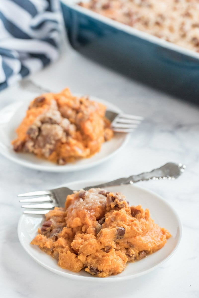 sweet potato casserole serving on white plates