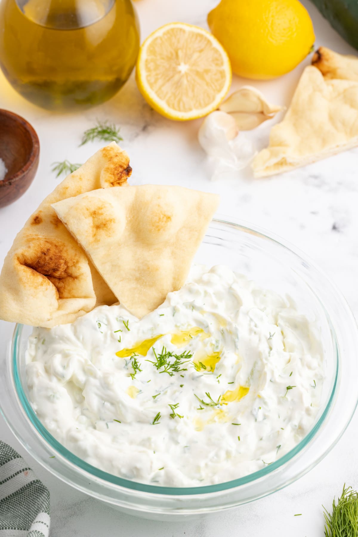 tzatziki sauce in a bowl with pita chips