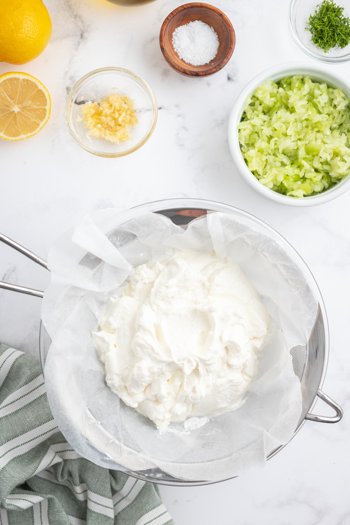 draining yogurt in strainer