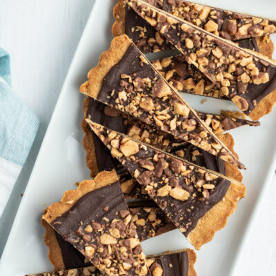 chocolate toffee wedges on a white platter