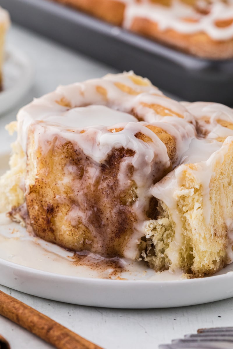 cinnamon roll cut open on plate