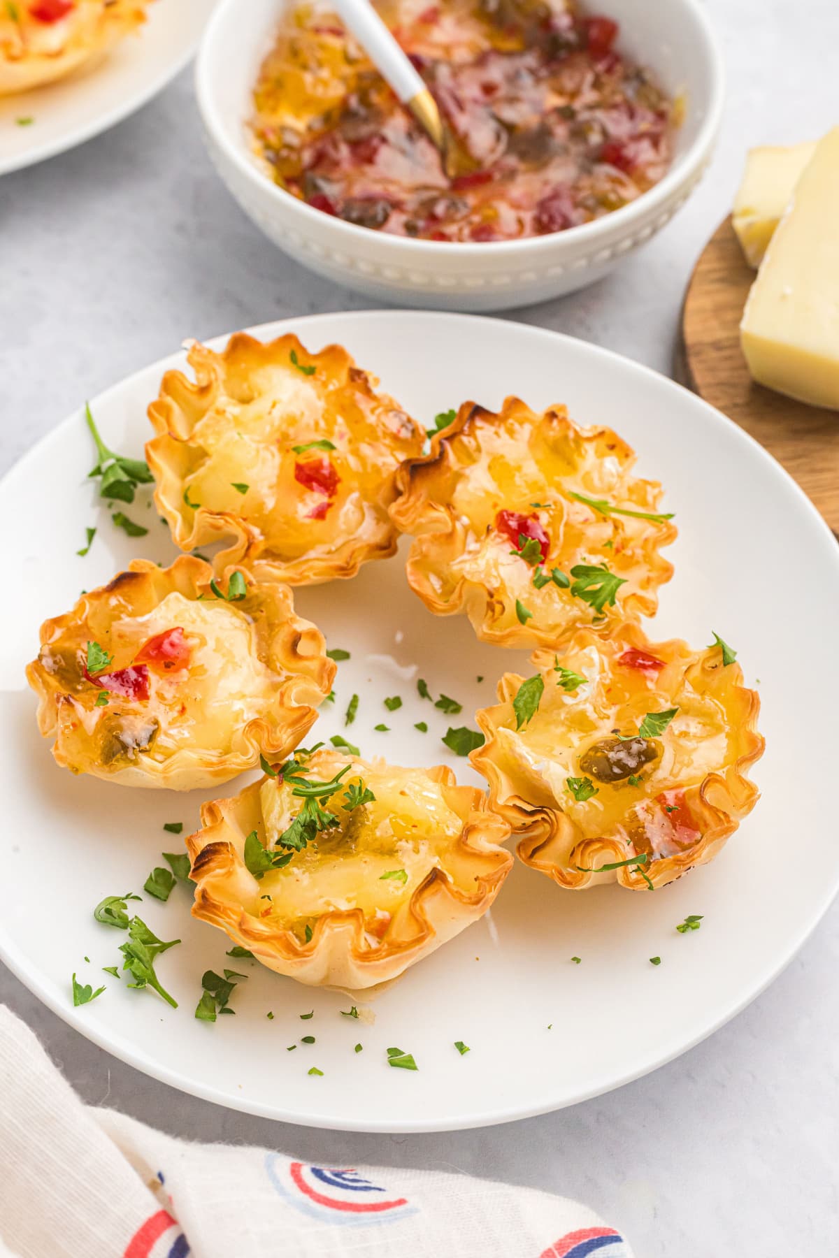 5 hot brie kisses appetizers on a plate
