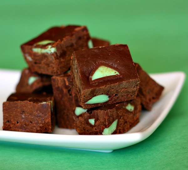 Stacked mint fudge on a white plate