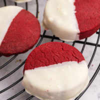 red velvet shortbread cookies dipped in white chocolate