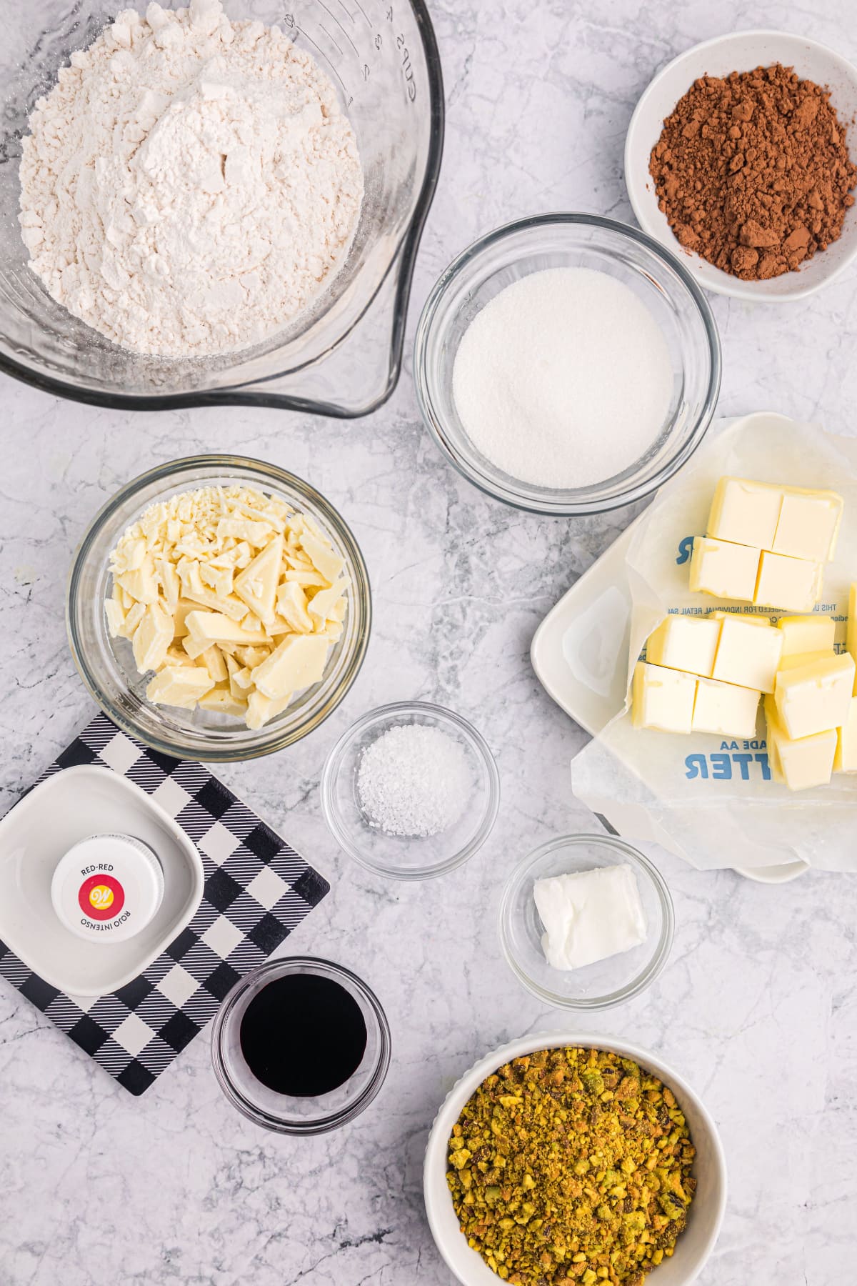 ingredients displayed for making red velvet shortbread cookies