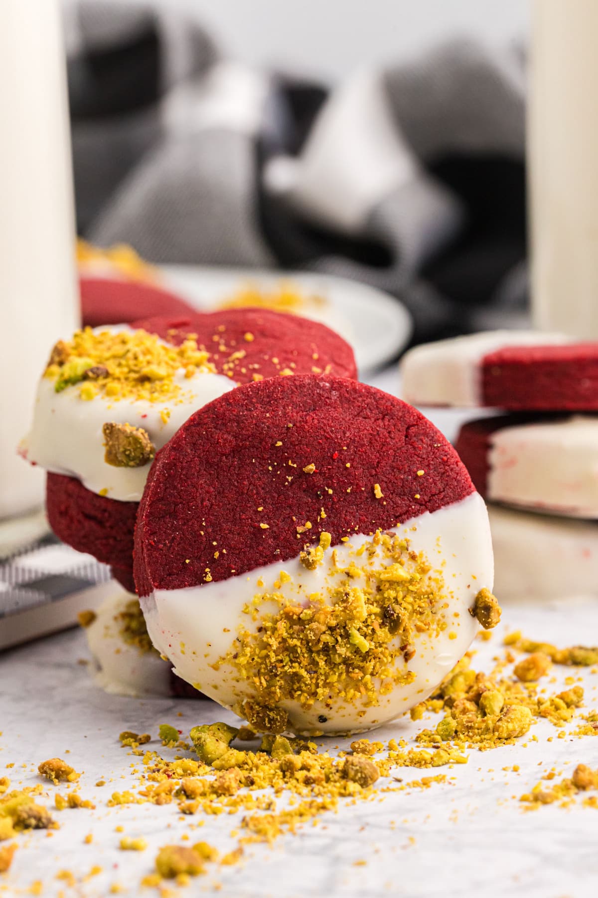 red velvet shortbread cookie dipped in white chocolate and pistachios