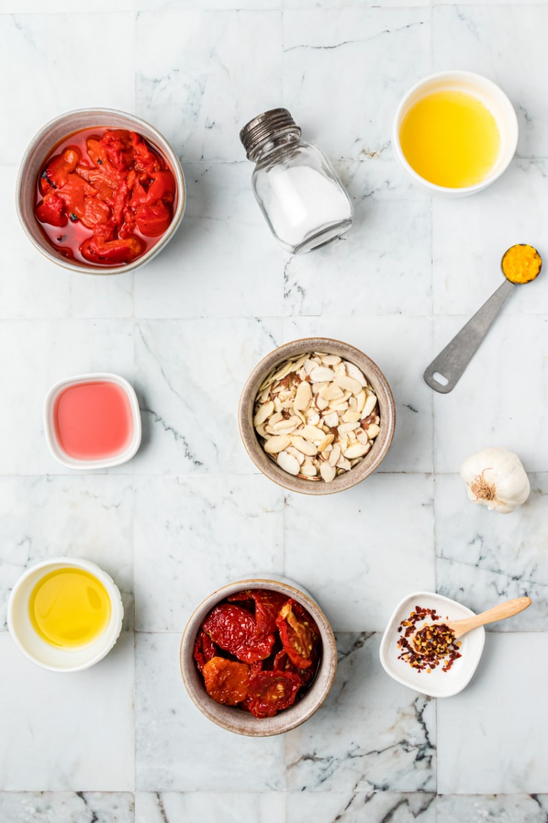 ingredients displayed for making roasted red pepper almond sprea